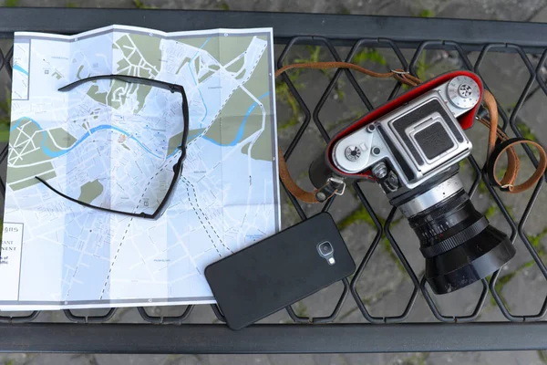 Travellers kit concept. Travel tourist map and other equipment — Stock Photo, Image