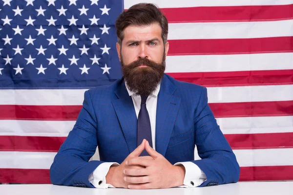 Patriotism, Protection, and Prosperity. his election campaign. brutal businessman is patriotic for usa. education reform at school in july 4. American citizen at USA flag. politician in the election — Stock Photo, Image
