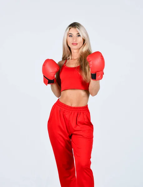 Fight for success. knockout and energy. Sport success. Boxer girl workout, healthy fitness. Sport and sportswear fashion. girl in boxing gloves punching. training with coach. Working core muscles Royalty Free Stock Images