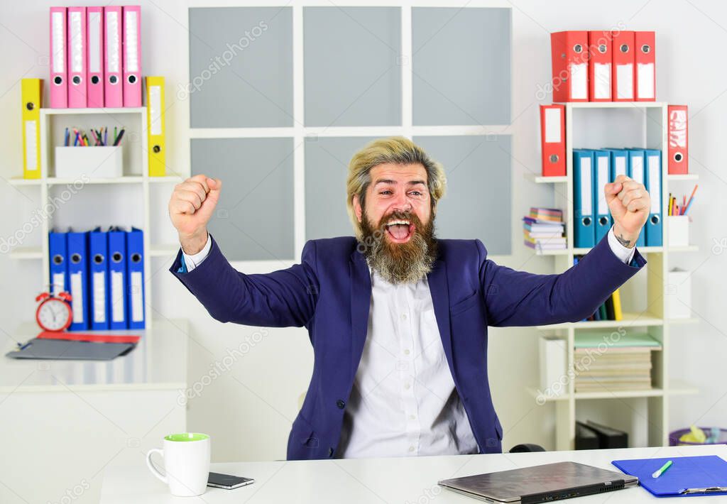 businessman sit in office. work online on computer. happy professional businessman at laptop. business man wearing smart casual clothes. handsome man drinking coffee from cup. value and worth.