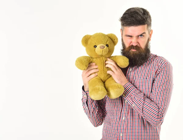 Guy with beard does not like to share soft toy. — Stock Photo, Image