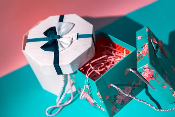 close up of colorful present boxes on table