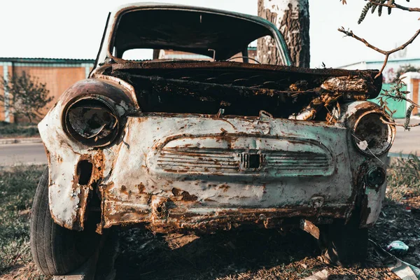 old rusty car in the desert