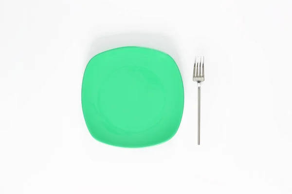 Puste Medium Spring Green Kolor Płyty Widelec Obok Niego Obiekt — Zdjęcie stockowe