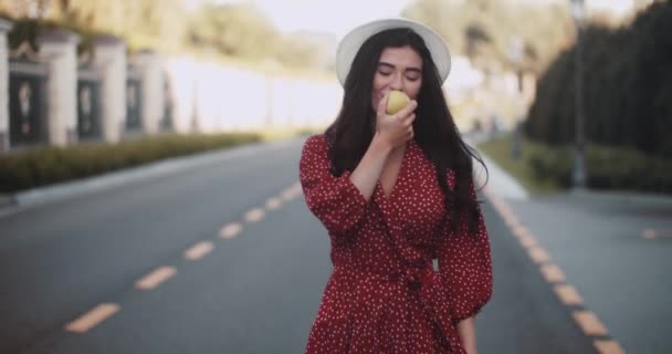 Cute Girl Walks Park Eats Apple Summer Young Woman Smiling — Stock Video