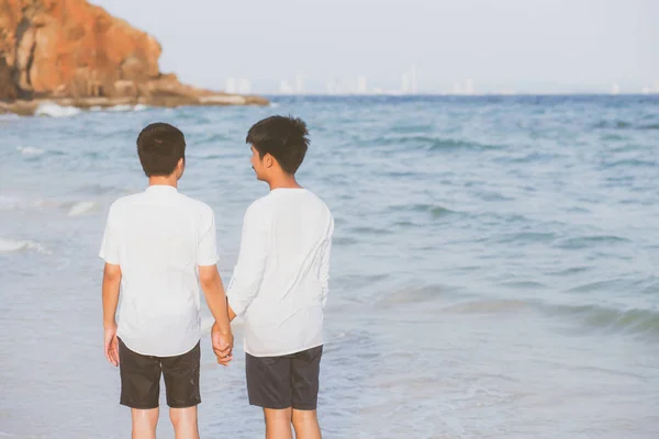 Back view homosexual portrait young asian couple walking with ch — Stock Photo, Image