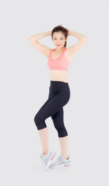 Hermoso retrato joven asiático mujer de pie entrenamiento estiramiento mu —  Fotos de Stock