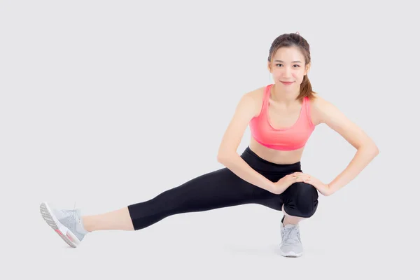 Hermoso retrato joven mujer asiática fitness con la pierna estirada —  Fotos de Stock