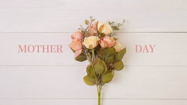 Beautiful flower on wooden background with romantic, mother day or valentine day with pastel tone, spring or summer nature background for decoration, bouquet floral for gift on desk, holiday concept.