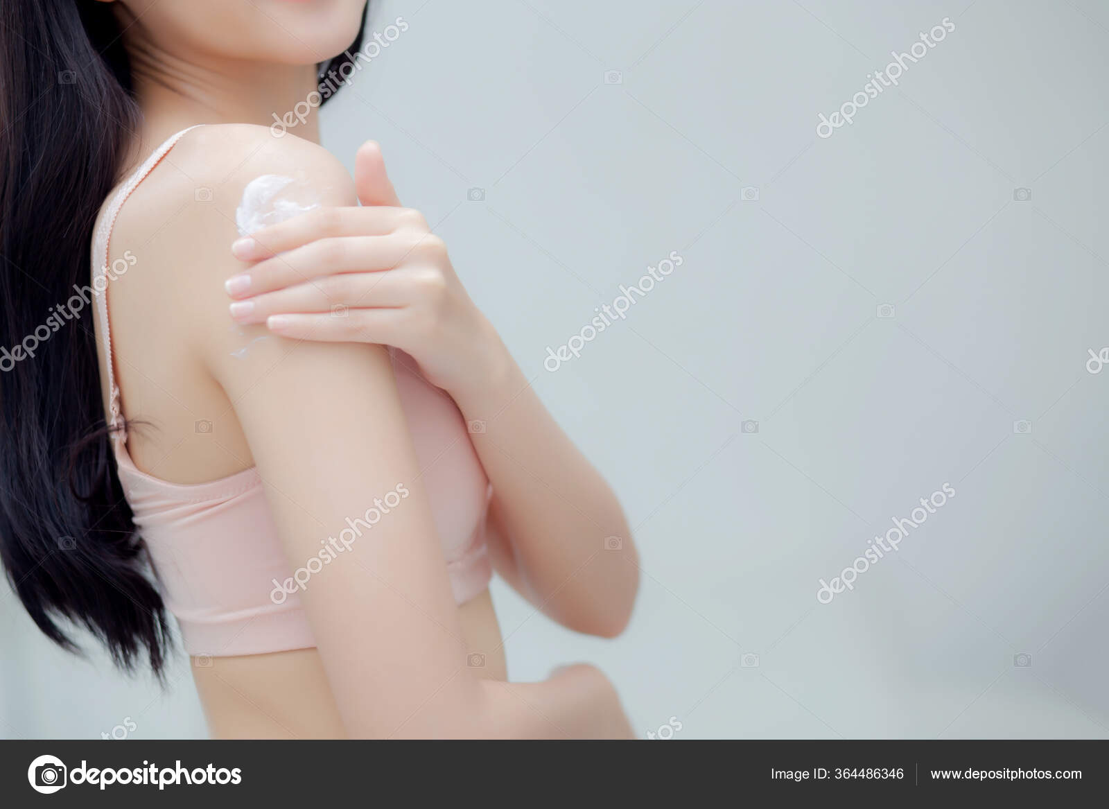 Beautiful Sexy Young Asian Woman Look Mirror Applying Cream