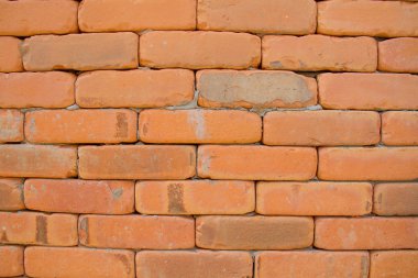 kırmızı tuğla duvarın arka