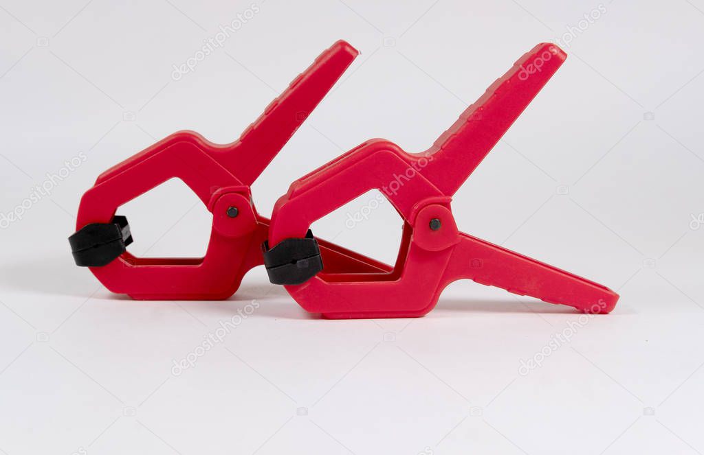 plastic mechanical vise for clamping parts on white background