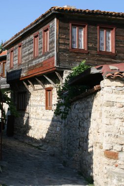 Nesebar, Bulgaria, July 23, 2012. Old Town of Nesebar. Authentic wooden facade of a Bulgarian house. ground floor made of stone