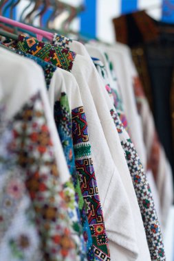 Shirts on sale. Ukrainian women's embroidery. National embroidered pattern on the sleeve of a linen shirt. 