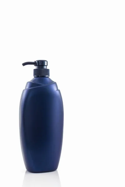 Dark blue bottle on a white background. — Stock Photo, Image