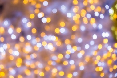 Soyut altın ve gümüş bokeh arka plan. Noel bokeh ışık