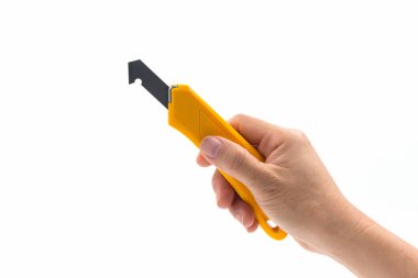 Sarı Plastik tutan Closeup el laminat kesici bıçak.