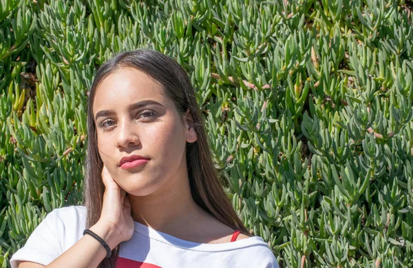 portrait of young girl of Latin or American appearance, enjoying nature