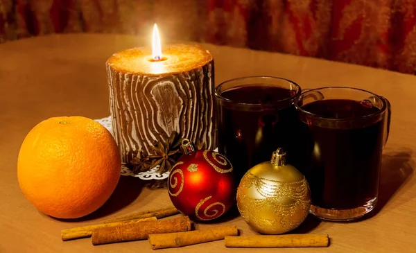 Two glasses of mulled wine and candle — Stock Photo, Image