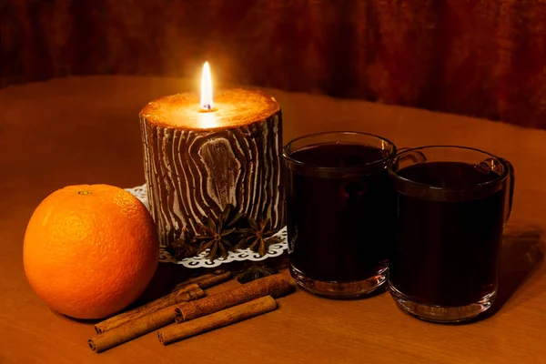 Two glasses of mulled wine and candle — Stock Photo, Image