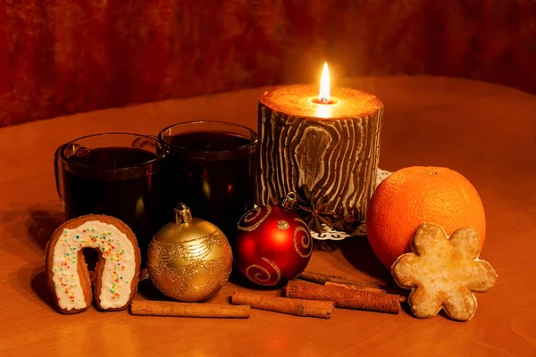 Two glasses of mulled wine and candle — Stock Photo, Image