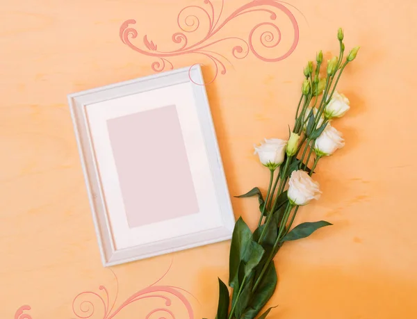 Picture frame and eustoma flower Royalty Free Stock Photos