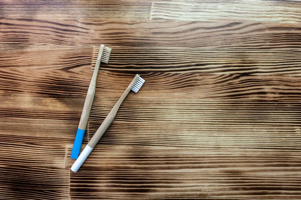 White Blue Bamboo Toothbrushes Lie Wooden Background Eco Friendly Texture — Stock Photo, Image