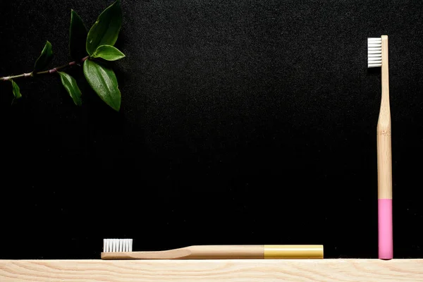 Pink Yellow Bamboo Toothbrush Slate Background Green Leaf Place Text — Stock Photo, Image