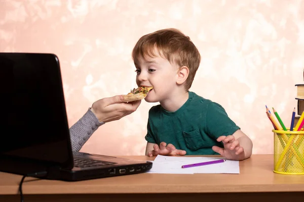 Three Year Old Child Sits Table Laptop Books Eats Slice — Stock Photo, Image