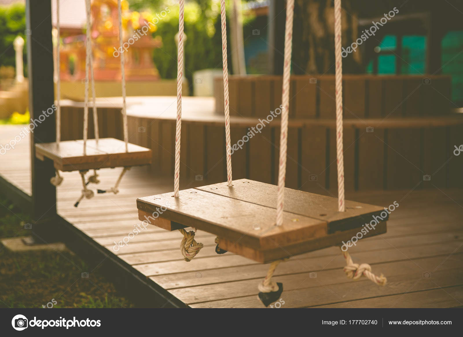Swing Woodedn Seat With Rope In Playground Vintage Toned Stock Swing Woodedn Seat With Rope In Playground Vintage Toned Stock Photo