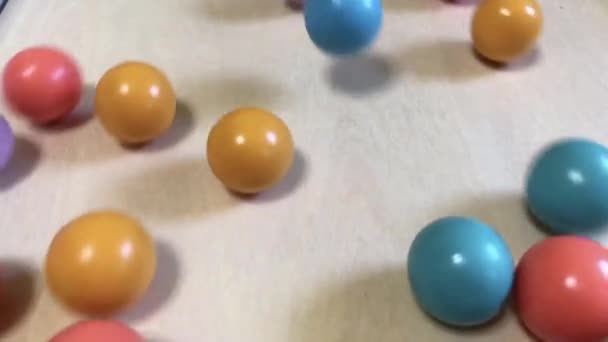 Wooden Balls Small Developmental Toys Ride Table Top Bottom Fine — Stock Video