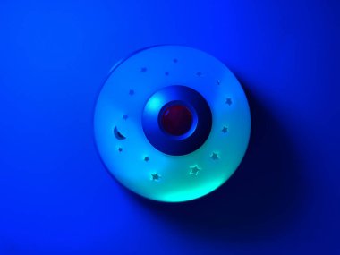 Glowing night lamp in different colors of RGB
