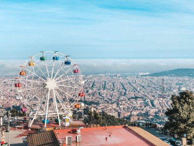 Beautiful view from the top of mountain Tibidabo, Barcelona. Traveling in Spain. Concept of tourism and leisure. clipart