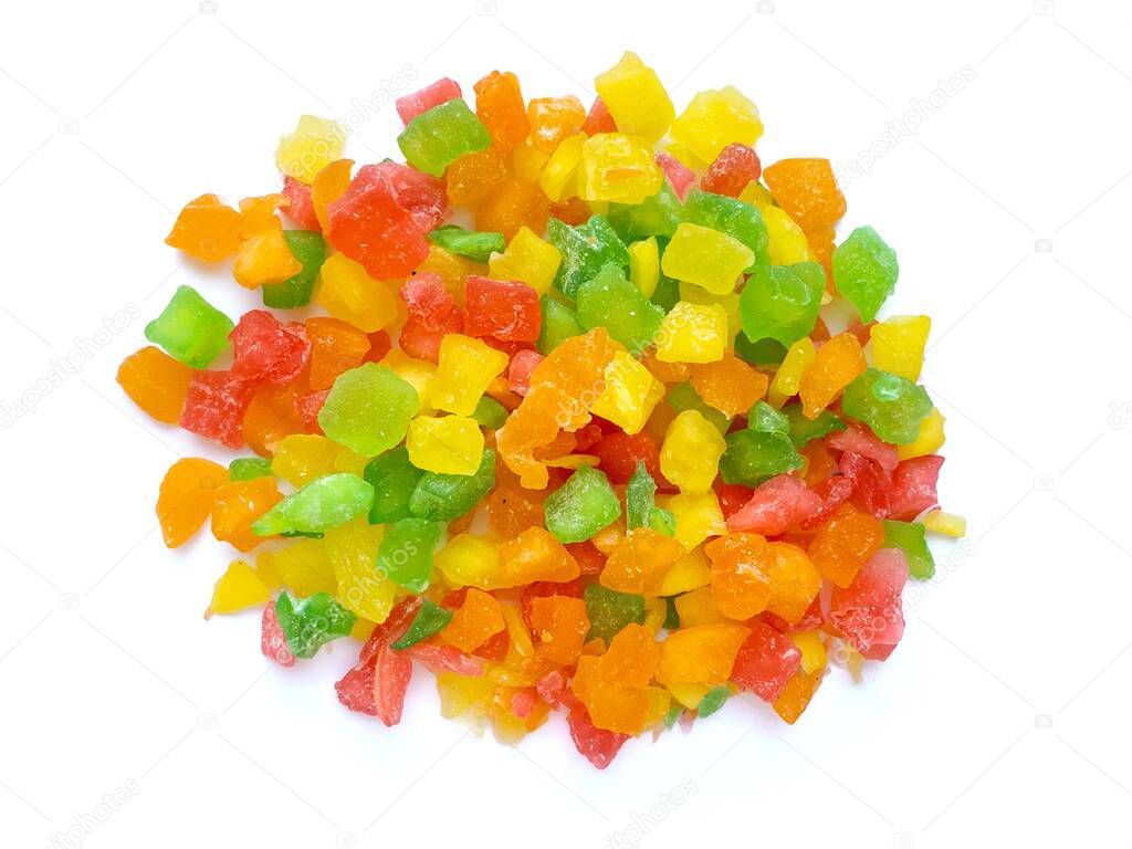 Handful of candied fruit isolated on a white background. Stacking for desserts, food photography.
