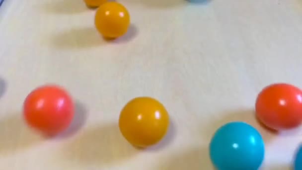 Wooden Balls Small Developmental Toys Ride Table Top Bottom Fine — Stock Video
