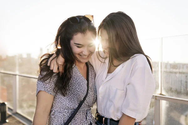 Pretty young couple of women smiling — Stock Photo, Image