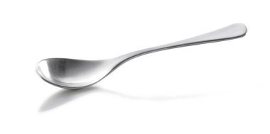 Beyaz arka plan üzerinde izole metal kaşık yakın çekim