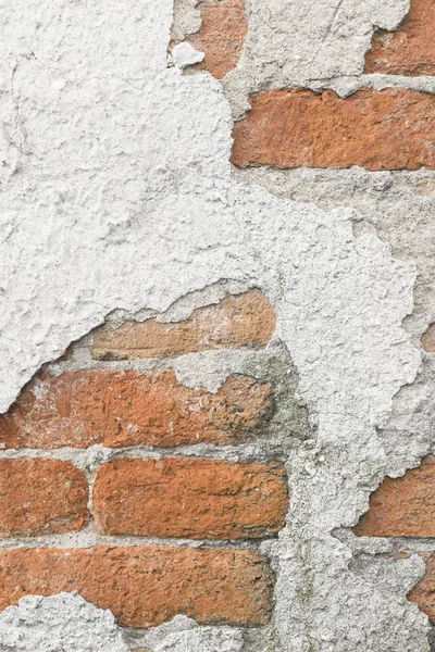 Cihlová zeď s kousky cementu — Stock fotografie