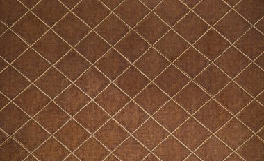 plain brown leather background with small squares