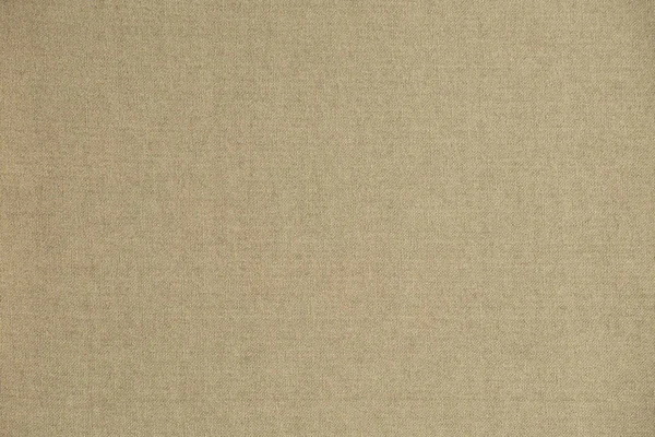 Canvas fabric in ochre tones for background — Stockfoto
