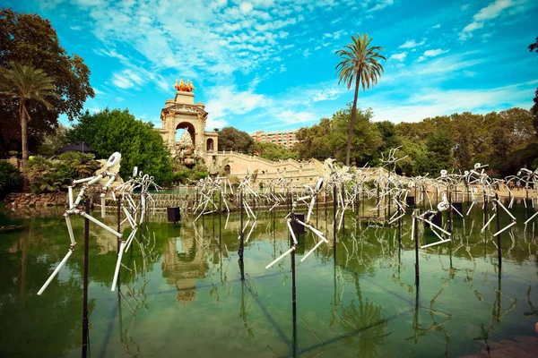 Strange shapes of people in park of Barcelona