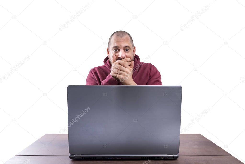 Male internet user with hand in front of mouth 