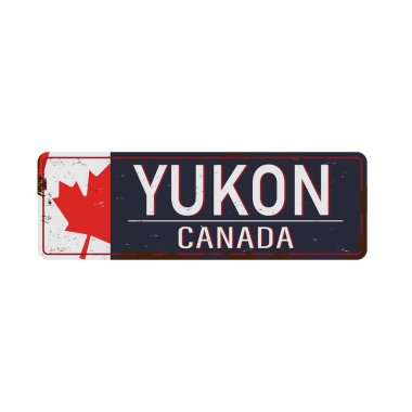 Yukon Canada beyaz arka planda paslı eski diş minesi tabelası