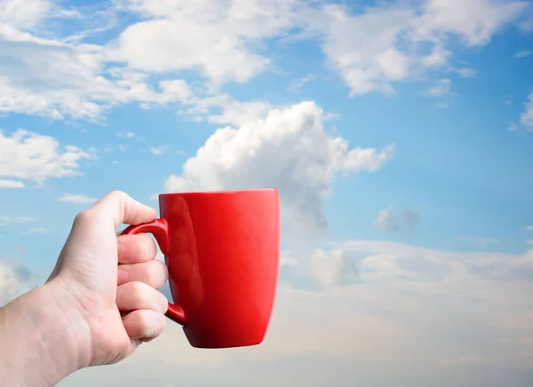 A cup of coffee on the a sky background