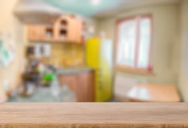 Wooden kitchen table — Stock Photo, Image