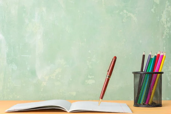 Notebook and school supplies — Stock Photo, Image