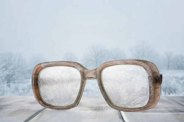 Frozen Glasses on wooden table — Stock Photo, Image