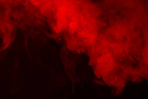 Red smoke texture on a black background