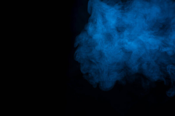 Blue smoke or steam texture on a black background