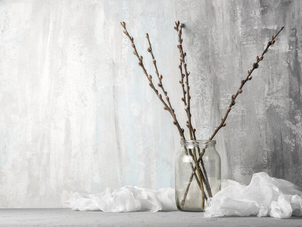 Willow branches on wooden  table, close up